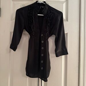 Ties in the back, button up top